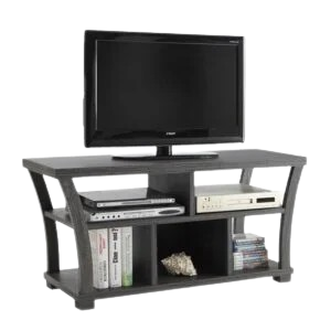 A flat-screen TV placed on a modern black TV stand with multiple open shelves holding electronic devices, books, and decorative items.