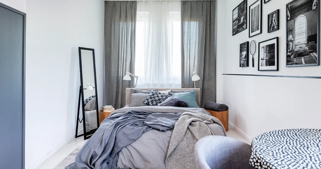 F-Cozy small bedroom with simple decor and mirror