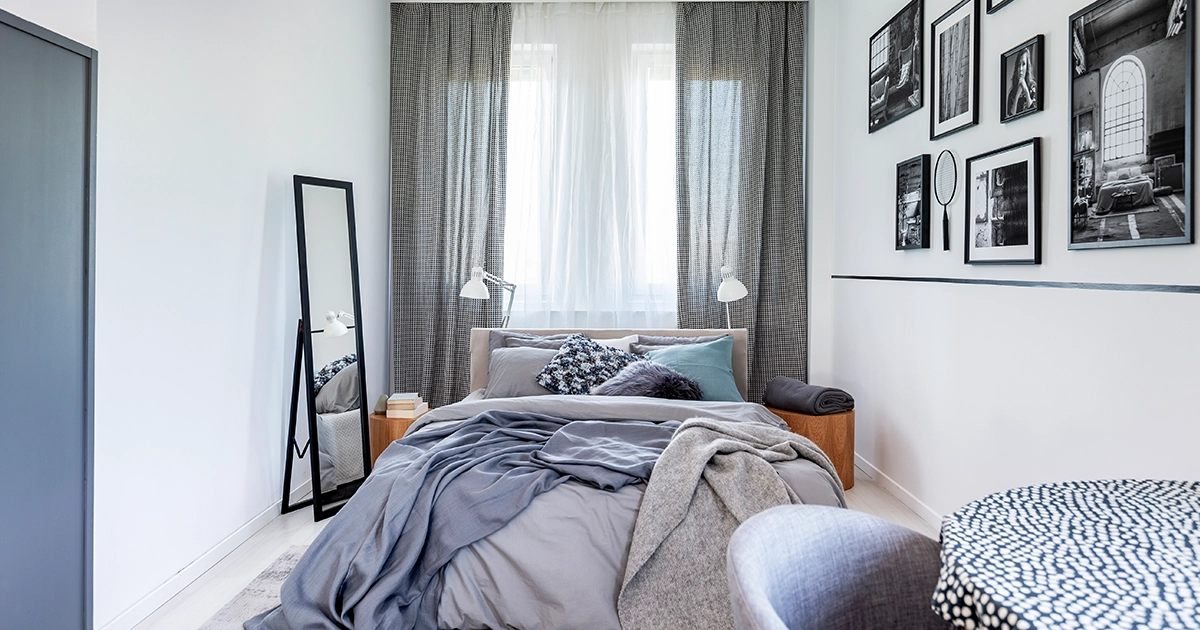 F-Cozy small bedroom with simple decor and mirror